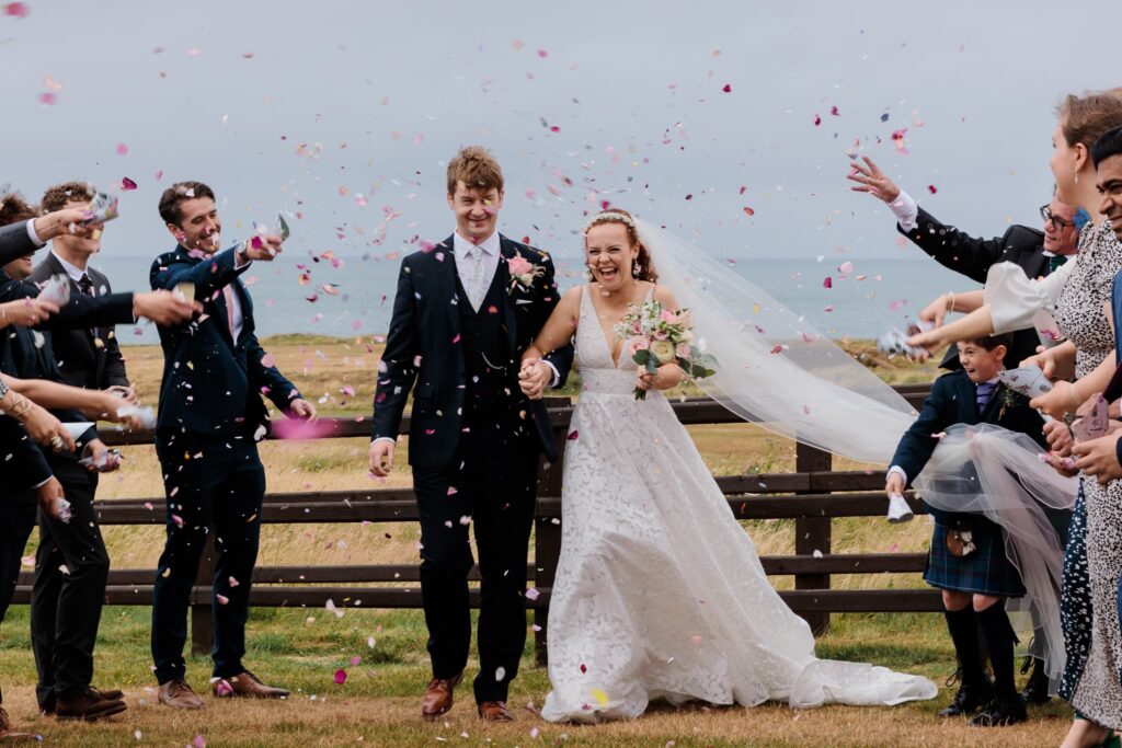 confetti isle, wedding couple with confetti