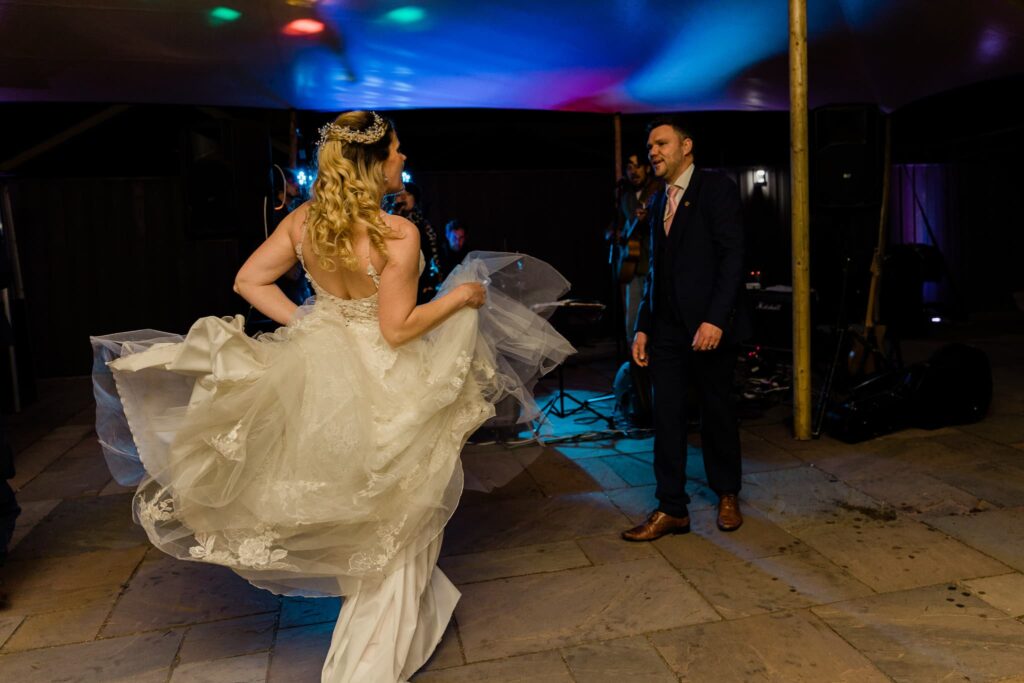 wedding couple first dance in outdoor reception west wales, 